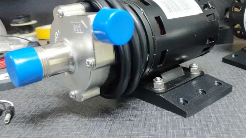 3D printed brewery pump bracket attached to the pump. 3D printed brewery pump bracket attached to the pump.