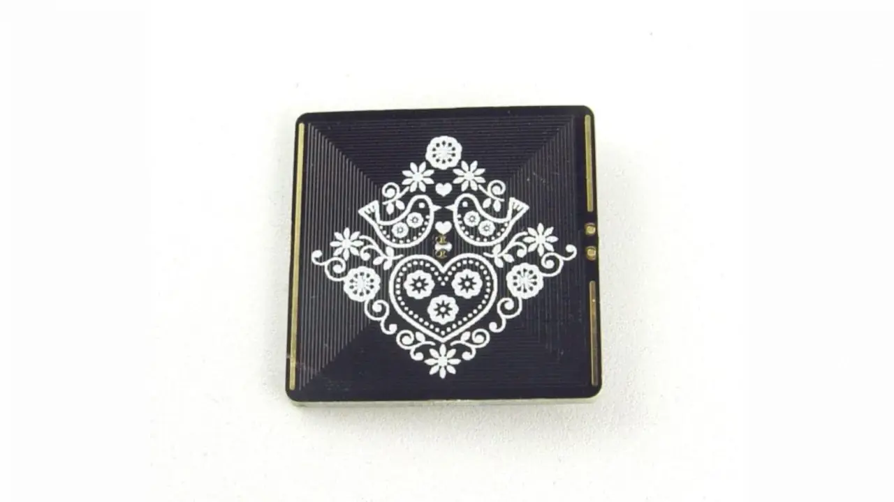 Bobricius’ Solar-powered flashing LED heart pendant PCB coil project. Back side. Bobricius’ Solar-powered flashing LED heart pendant PCB coil project. Back side.