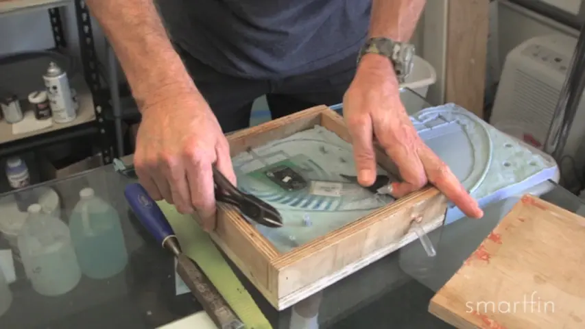 Construction of the SmartFin using molds, fiberglass, and epoxy resin. The electronics are embedded. Construction of the SmartFin using molds, fiberglass, and epoxy resin. The electronics are embedded.