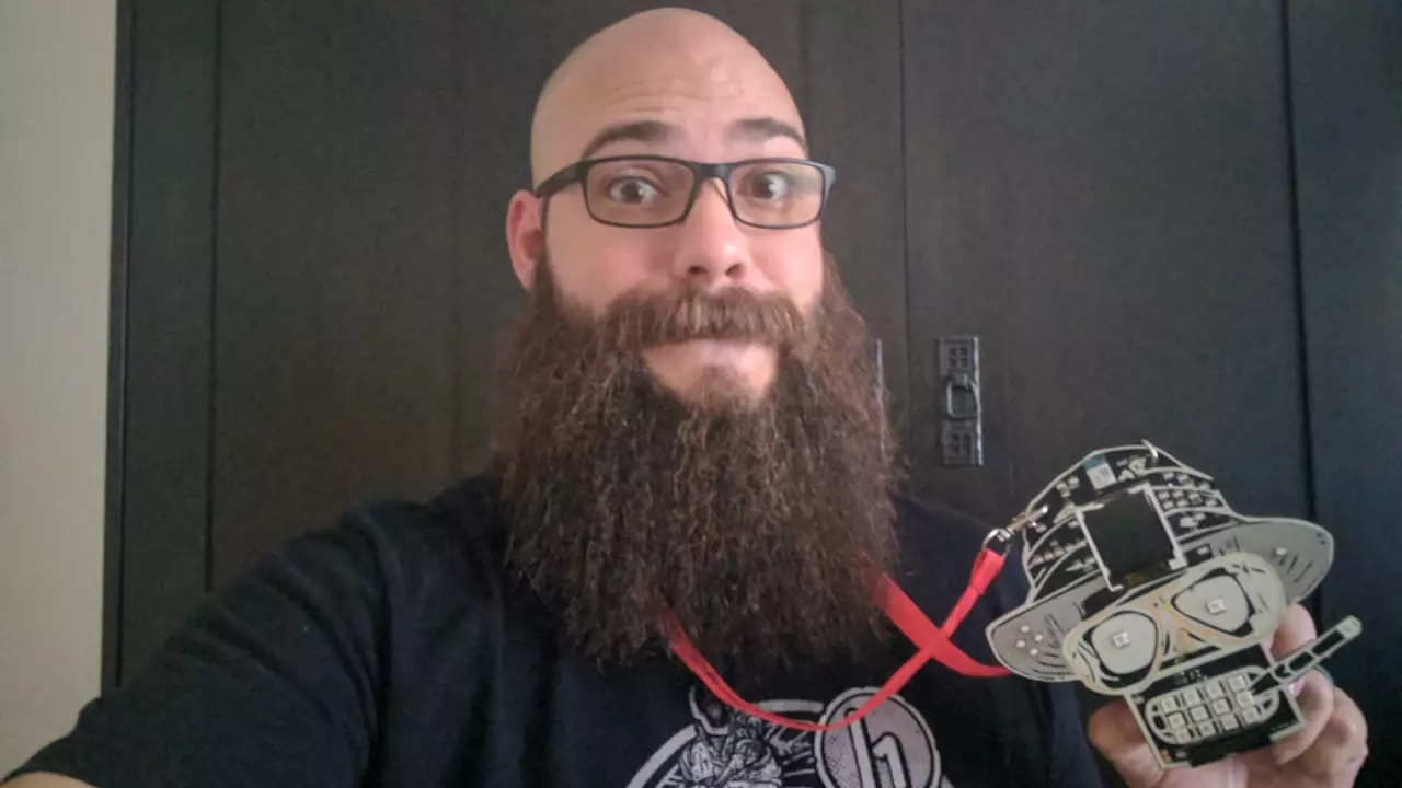 Figure 2: Hyr0n showing off the new badge! Figure 2: Hyr0n showing off the new badge!