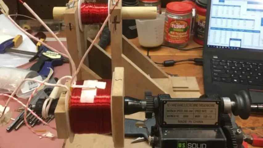 Josh winding his transformer. Spreadsheet in the background. Josh winding his transformer. Spreadsheet in the background.