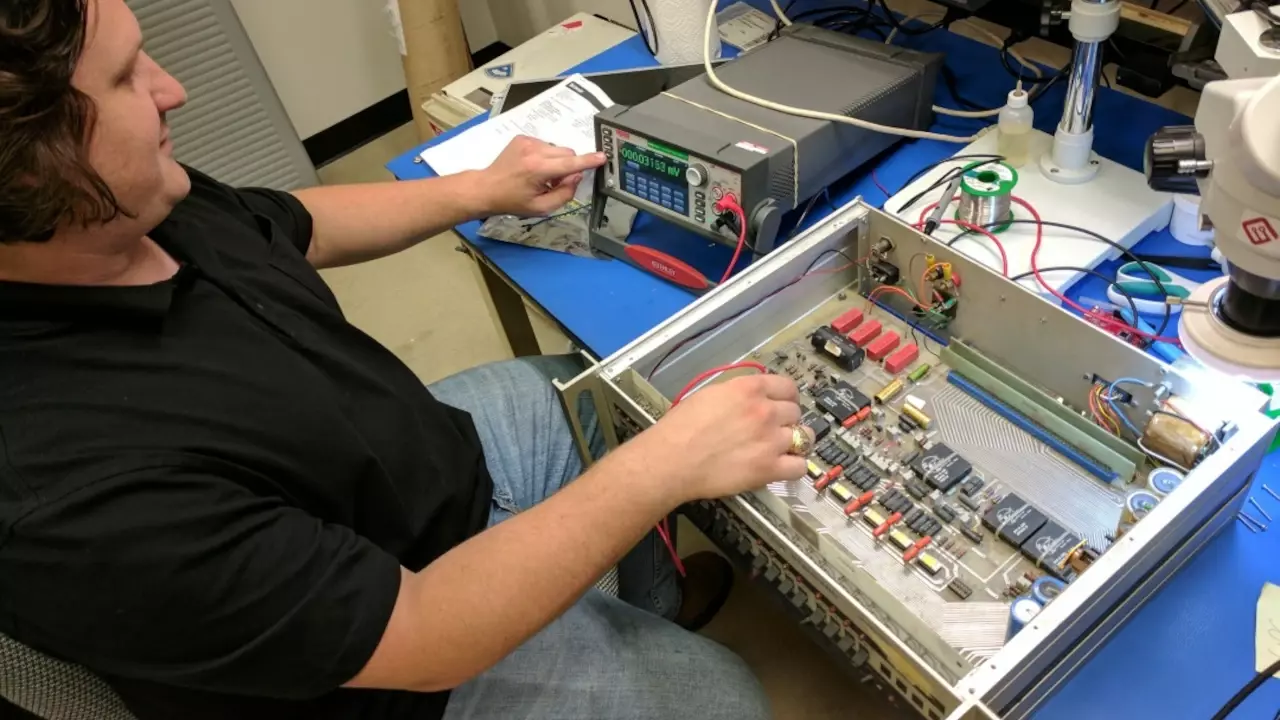 Figure 1: Stephen working on his Voltage Standard with the DMM7510. Figure 1: Stephen working on his Voltage Standard with the DMM7510.
